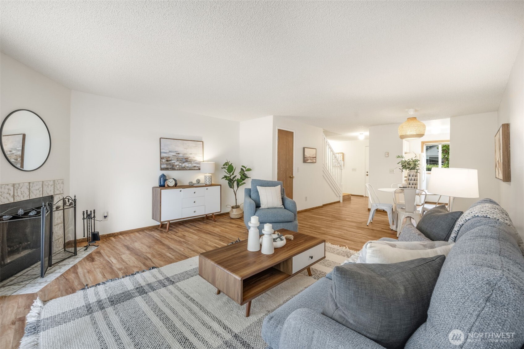 Spacious living room with wood burning fireplace