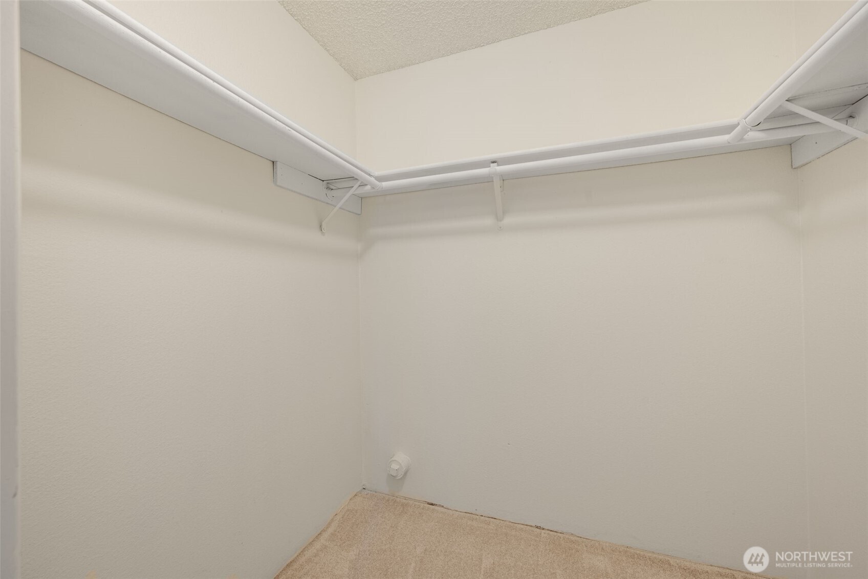 Large walk-in closet for main floor bedroom