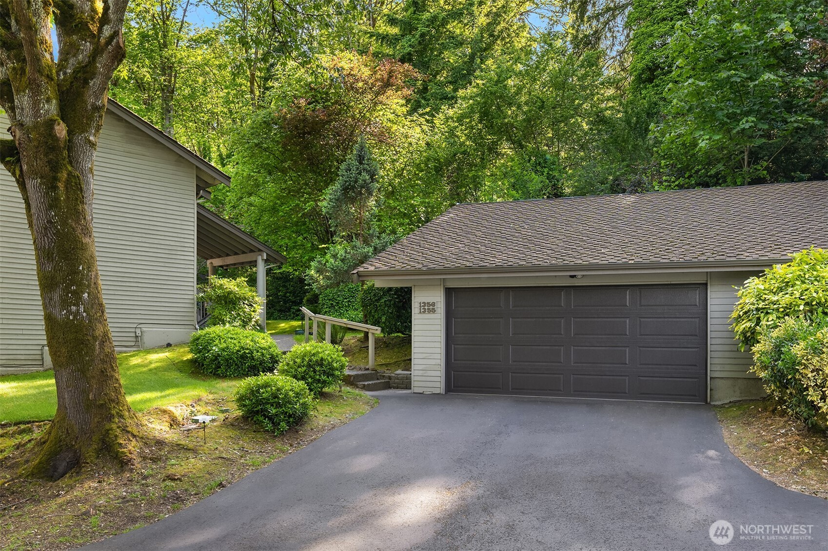 Shared garage; right side of garage belongs to this unit and includes a storage room
