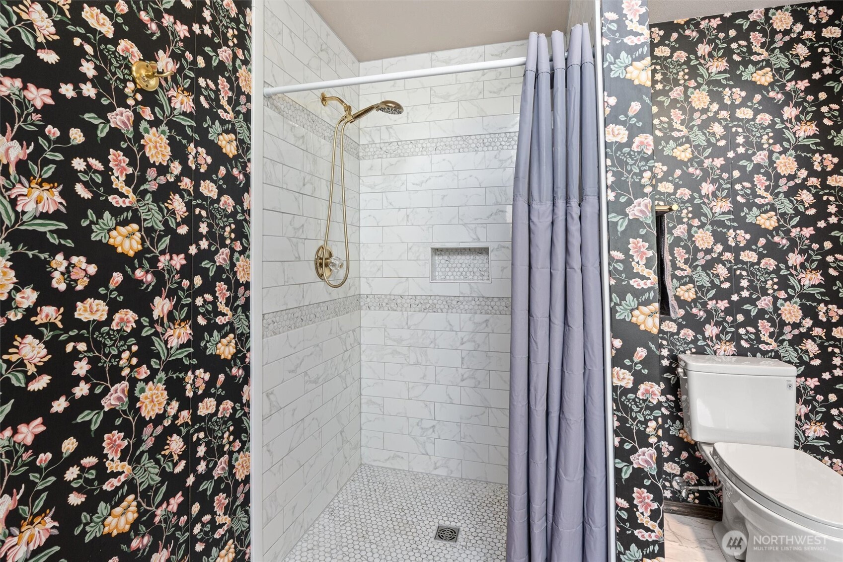 Updated ensuite five-piece bath with new tile shower and waterproof laminate tile flooring