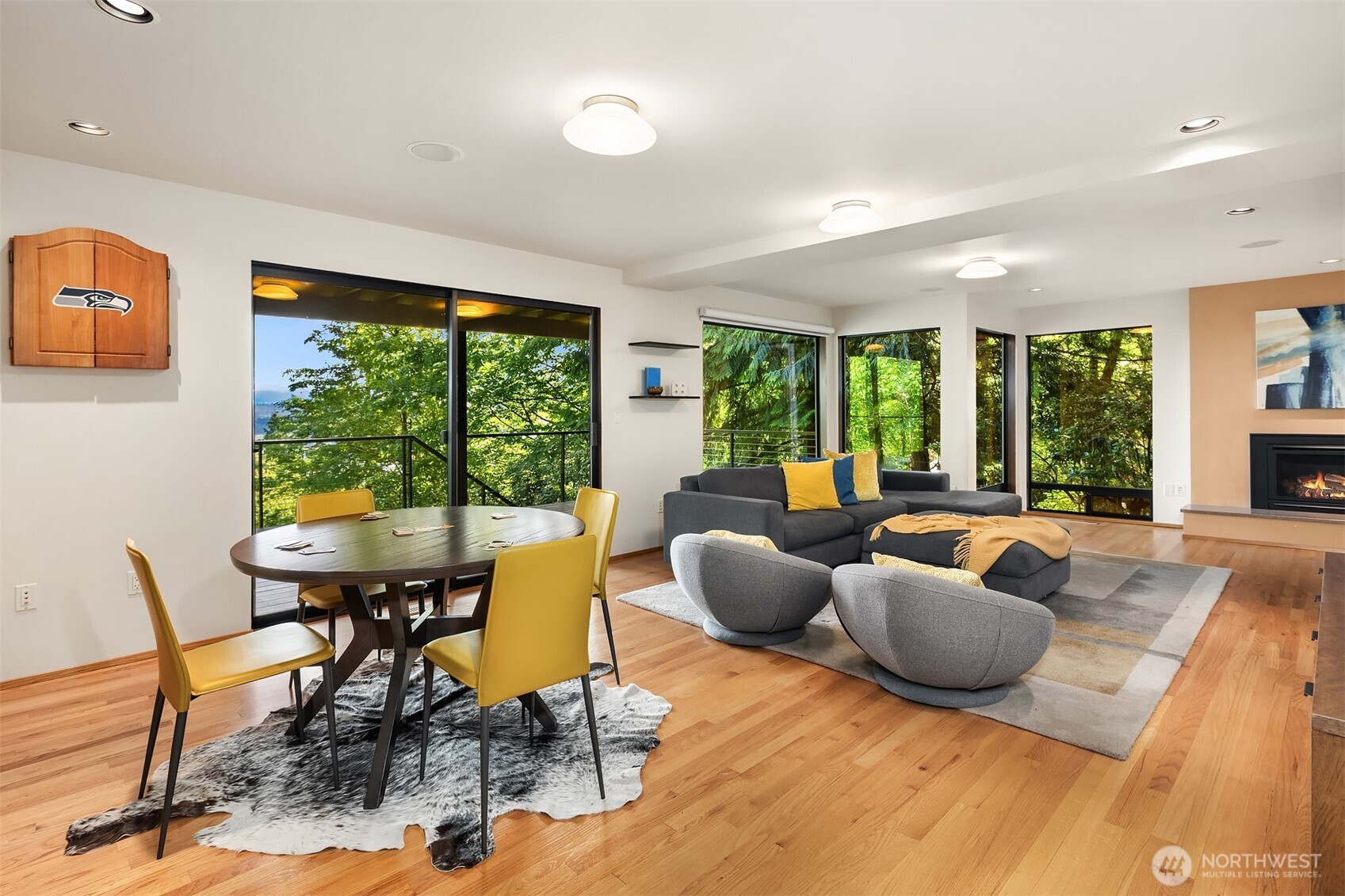 Huge, fireside rec room with access to the lower level deck.