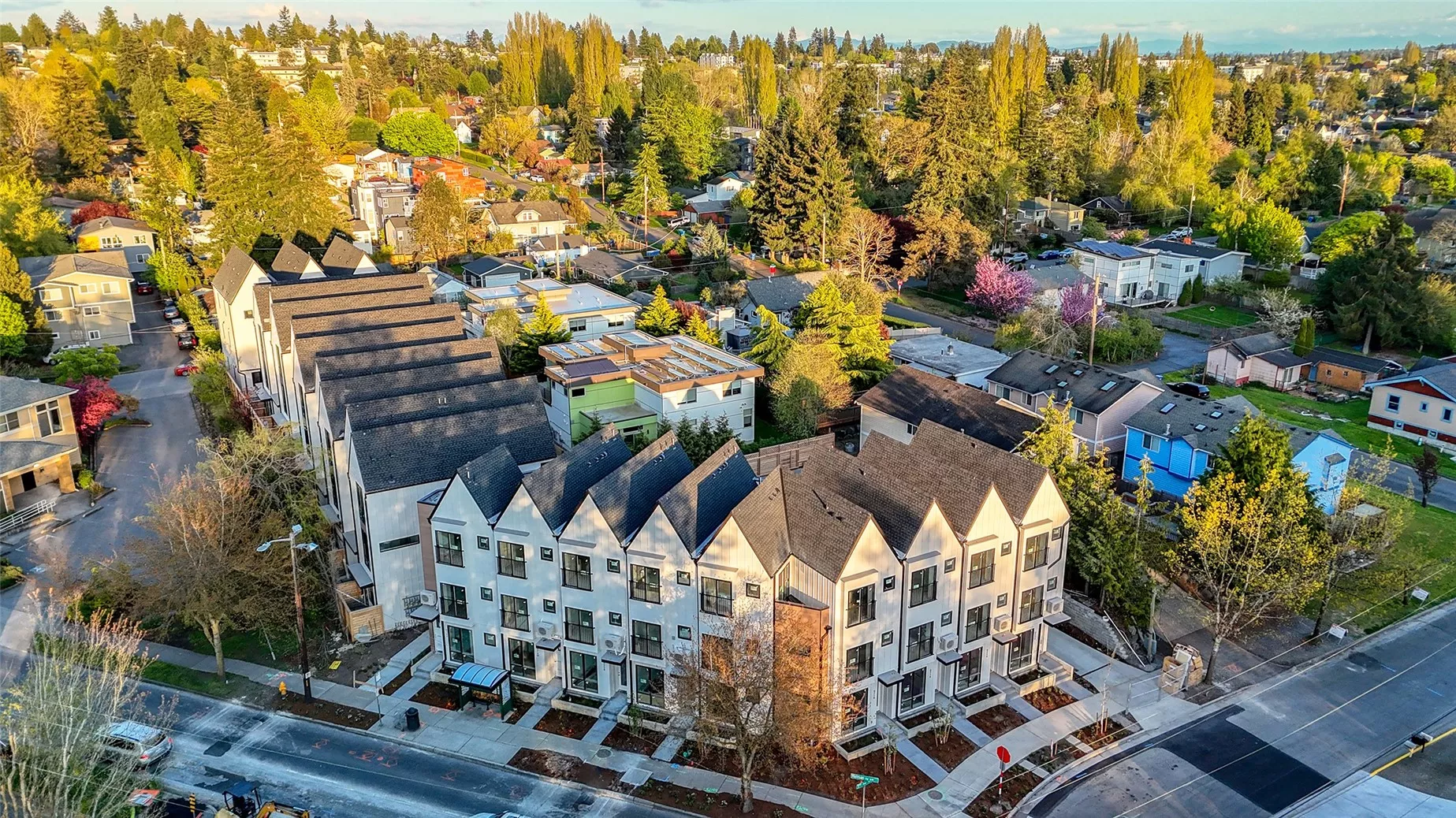Welcome to Elm by Shelter Homes — a picturesque new community nestled in the heart of Greenwood, where tree-lined streets meet striking modern design.