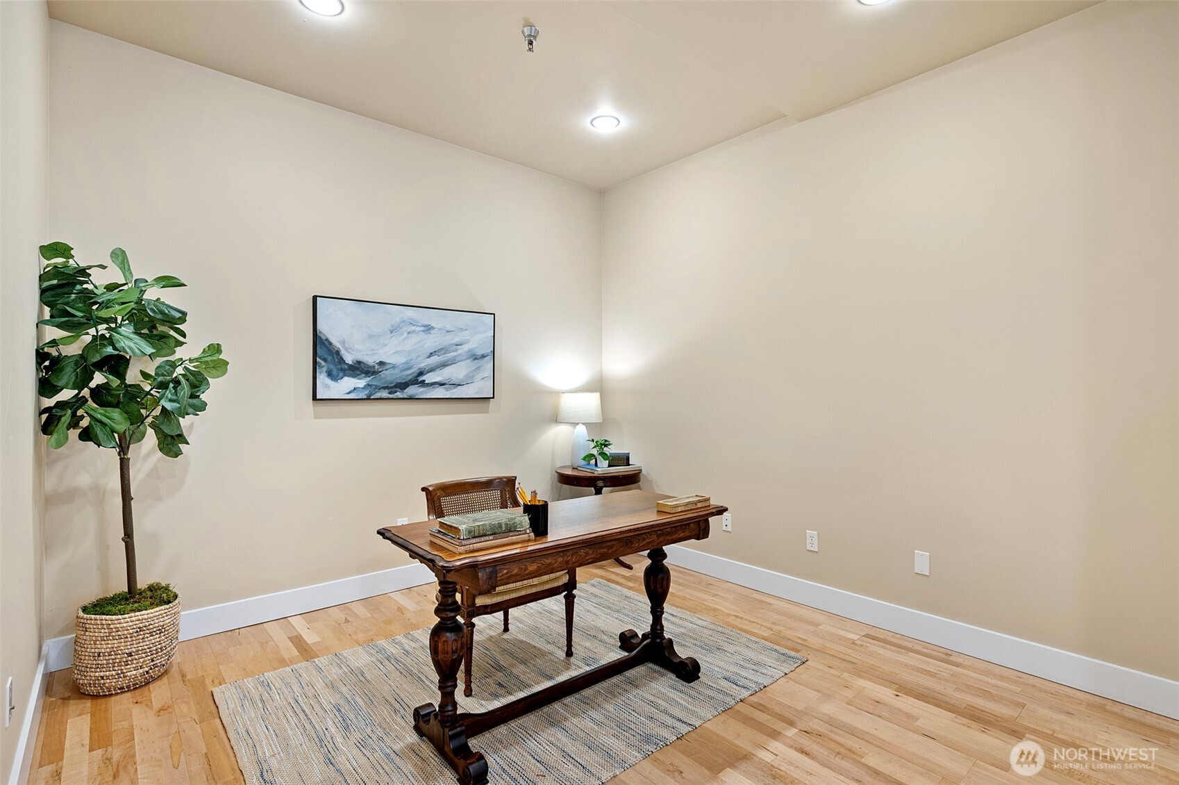 There is a large storage closet under these stairs. Check it out! The door seen in the upper center of this photo leads to your entrance from the outside.