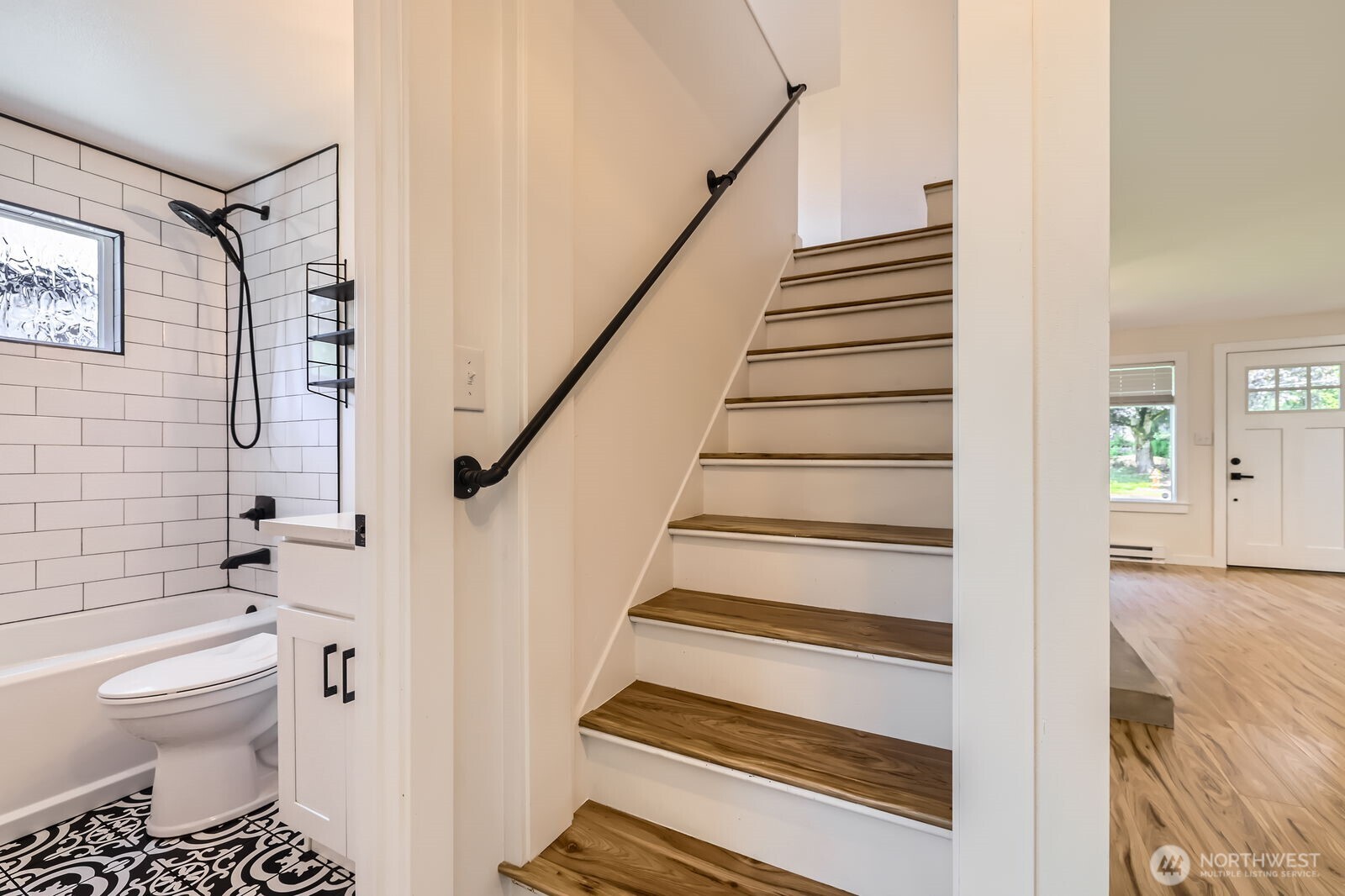 Stairs leading to the second-floor loft and 3rd bedroom just off the main living room