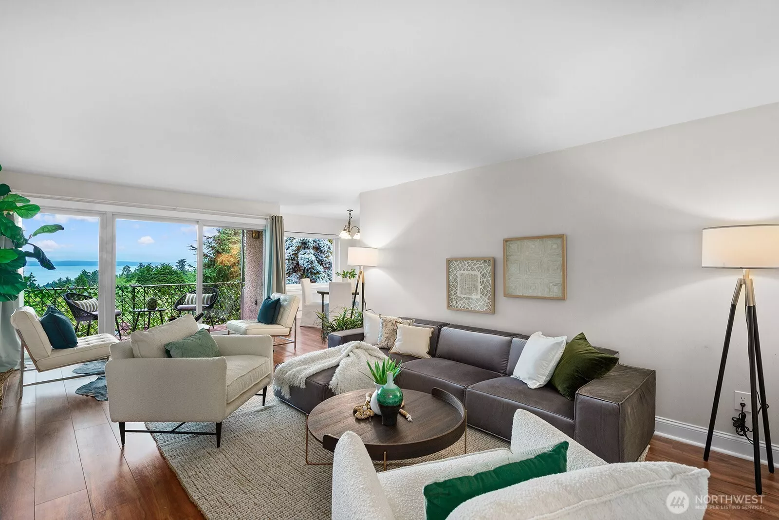 Light & Bright Living spaces and sweeping Sound & Mountain View from this Top Floor Home.