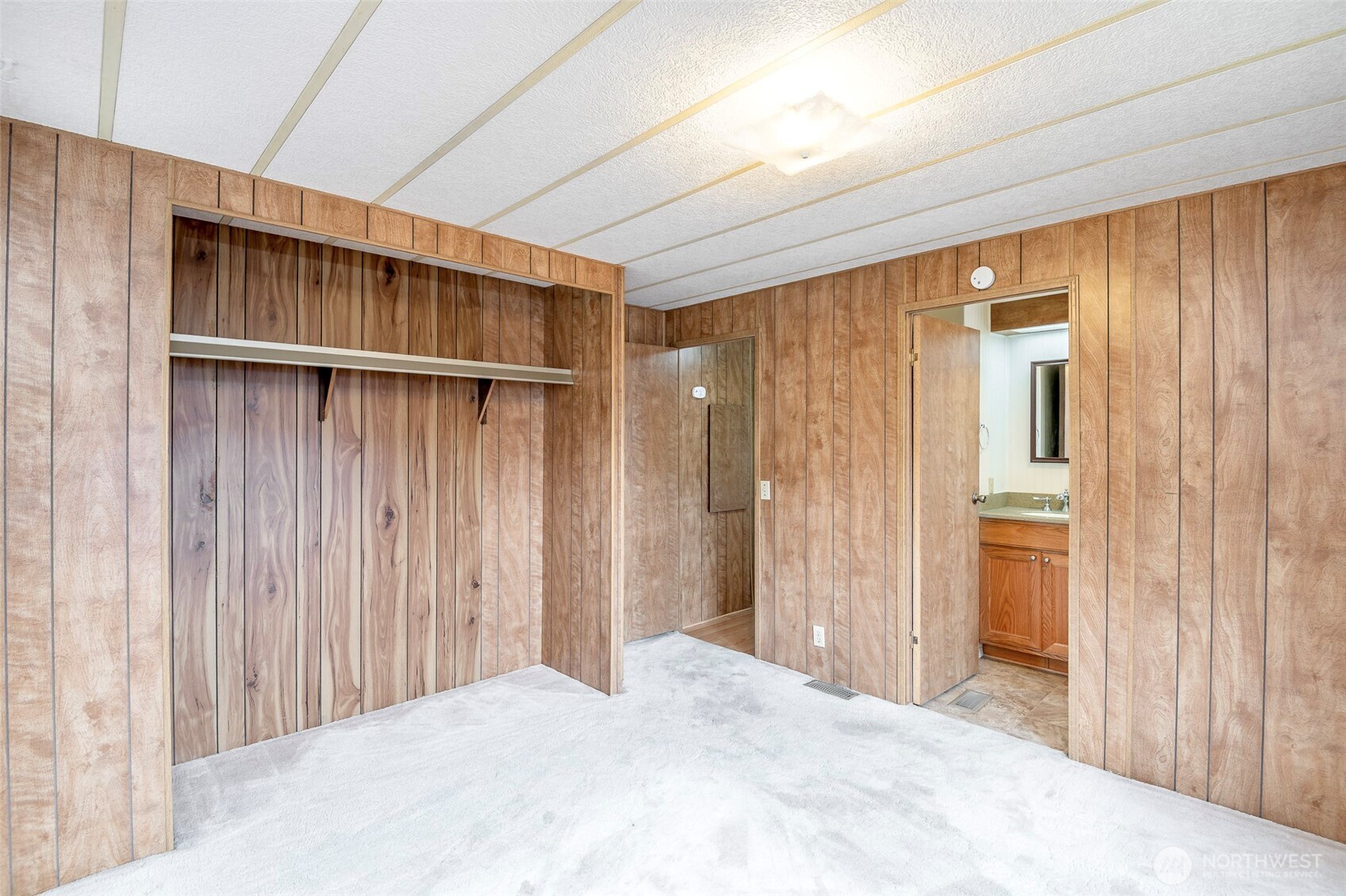 Primary Bedroom on one side of the house with it's own attached bathroom!