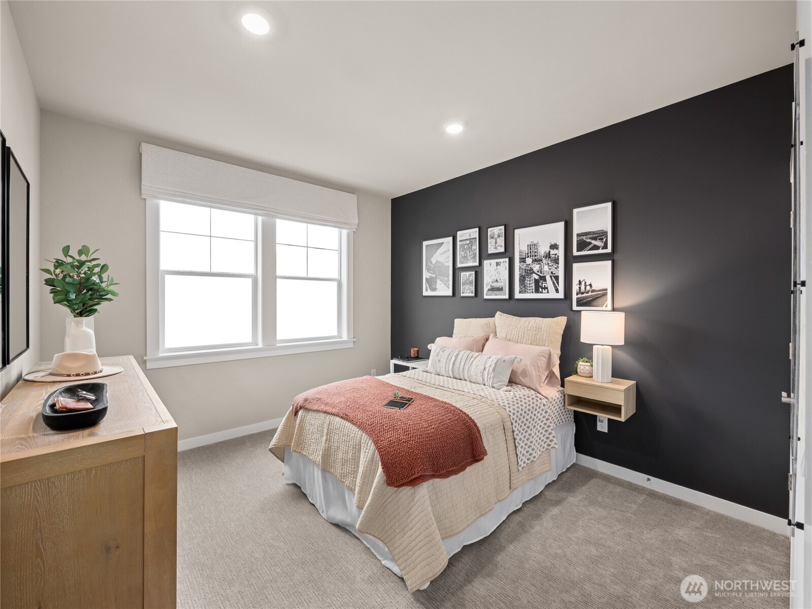 Bedroom/Office on main level with walk-in closet is one of the features makes this home desirable. Photo is representational. Actual home is under construction and finishes and colors will vary. See site agent for details.