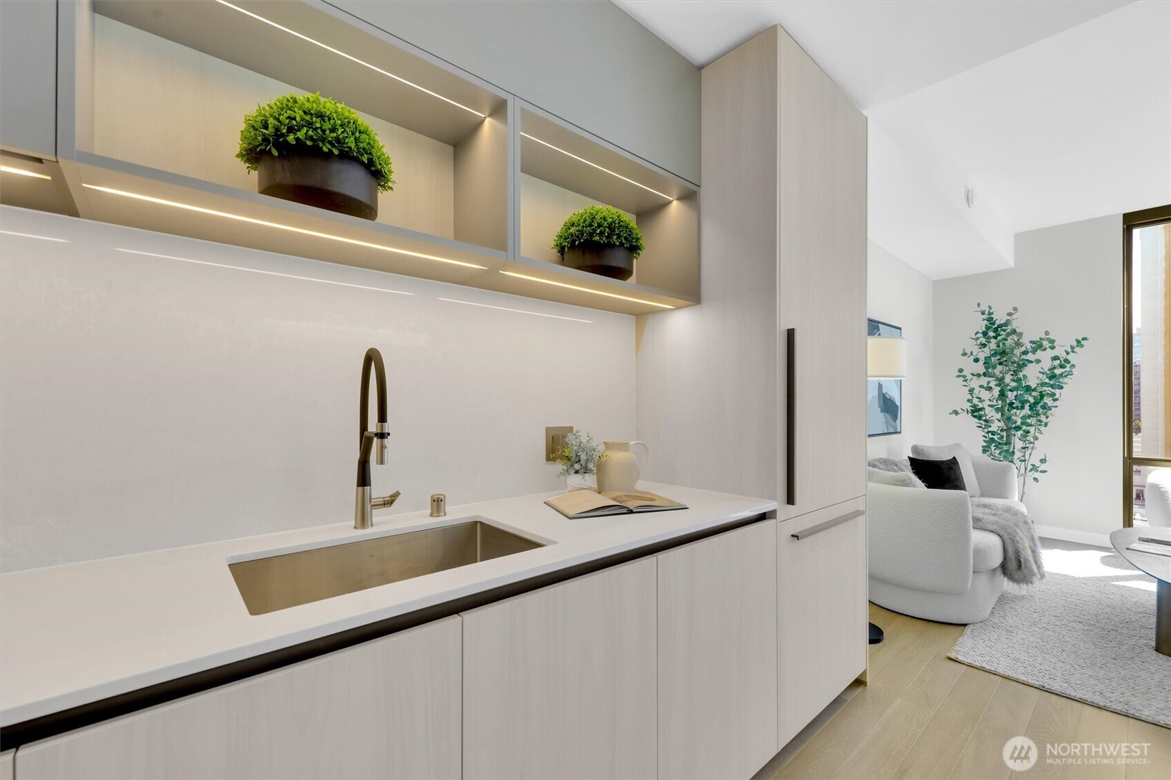 Sleek contemporary kitchen with deep sink