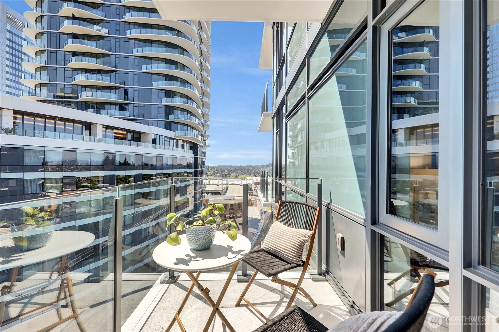 Big enough size balcony for coffee table and chairs with views to SE and center Avenue Square