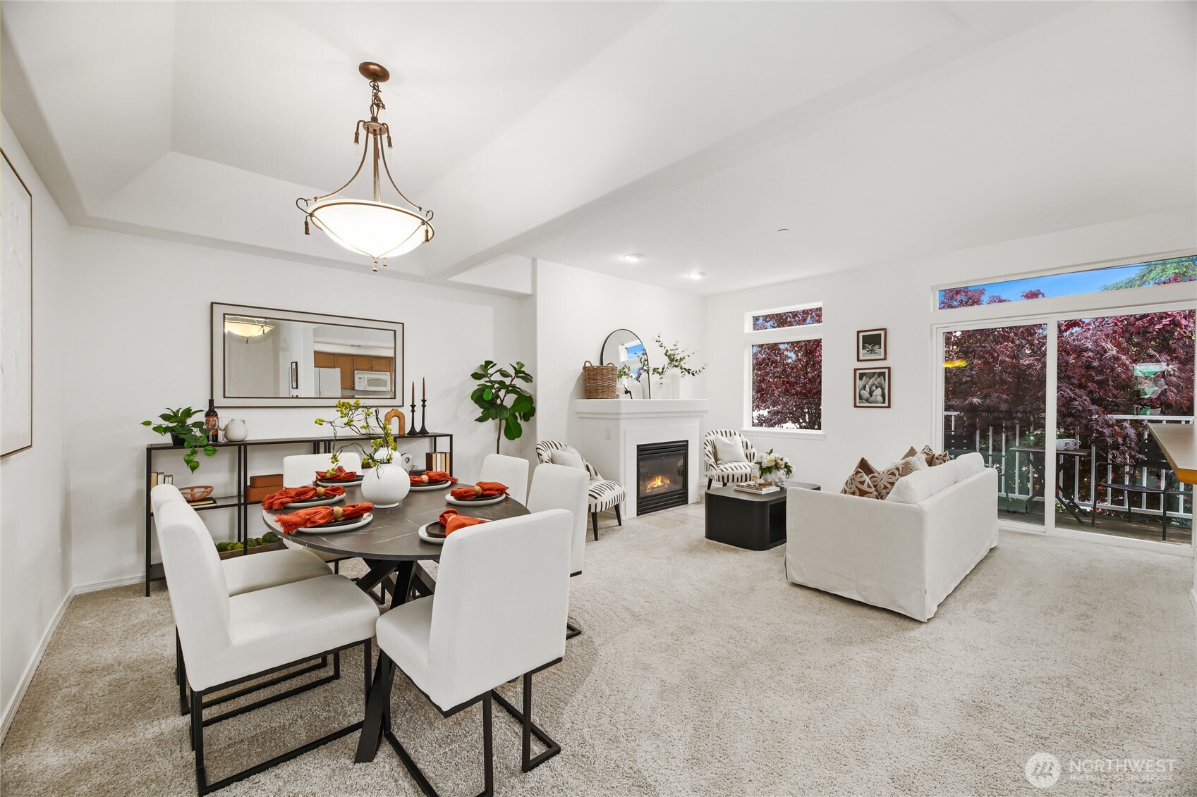Main floor boasts a large and open dining room, kitchen and living room.