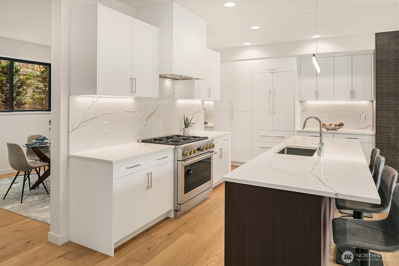 Interior photos are from the Model Unit at Lot 8 (298 118th Ave SE) at the same project. Floorplan and features are the same, but the color scheme and finishes will vary.