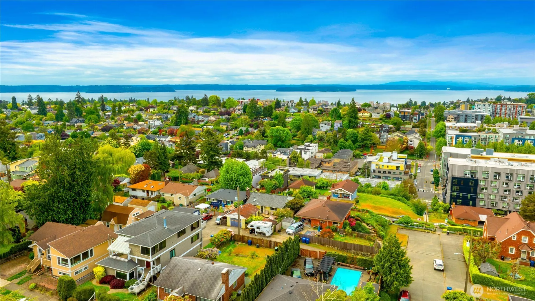 Sweeping sound, mountain and city views across the neighborhood and beyond to enjoy year around when your live here