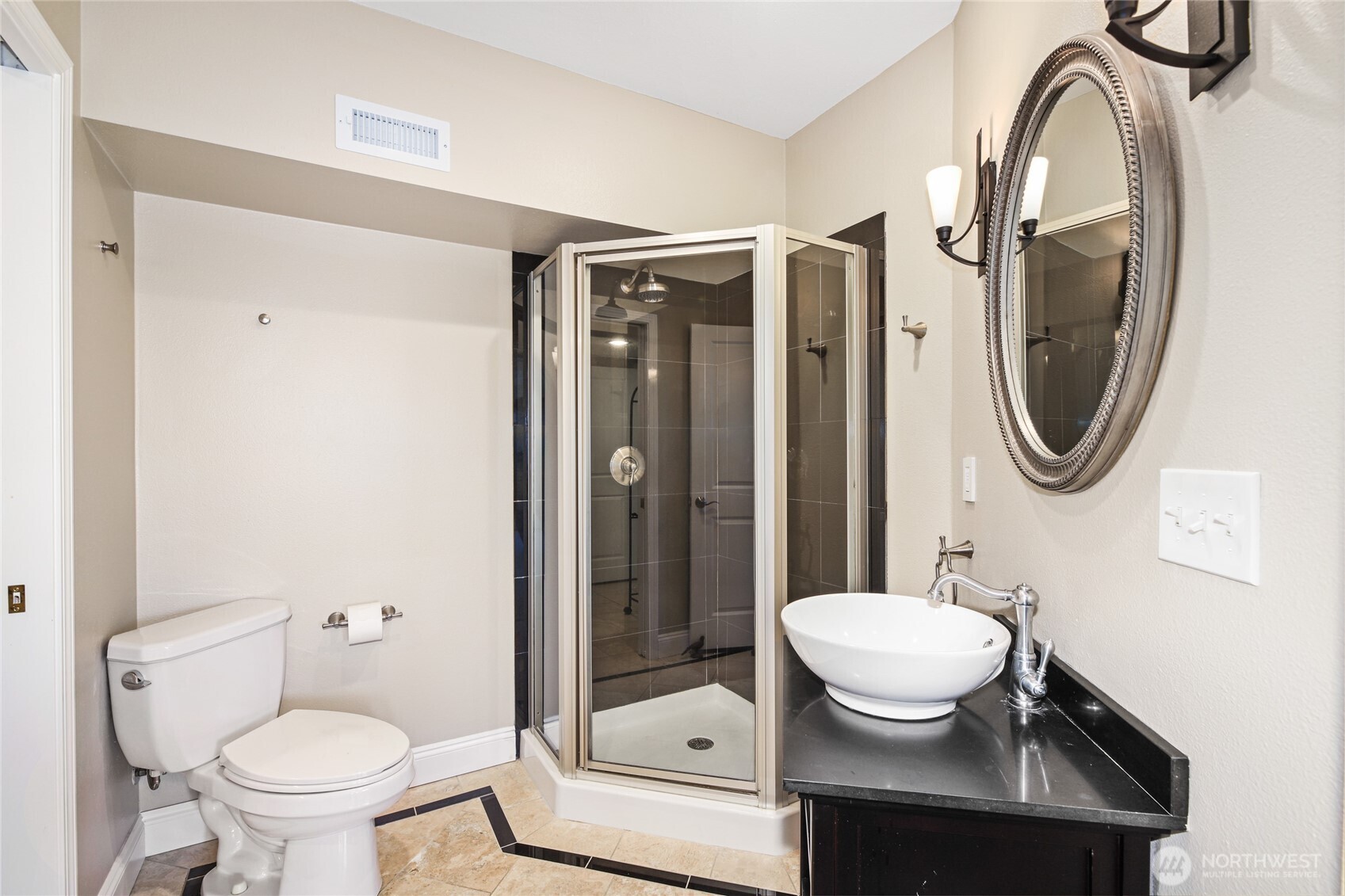 Lower level primary bedroom suite.