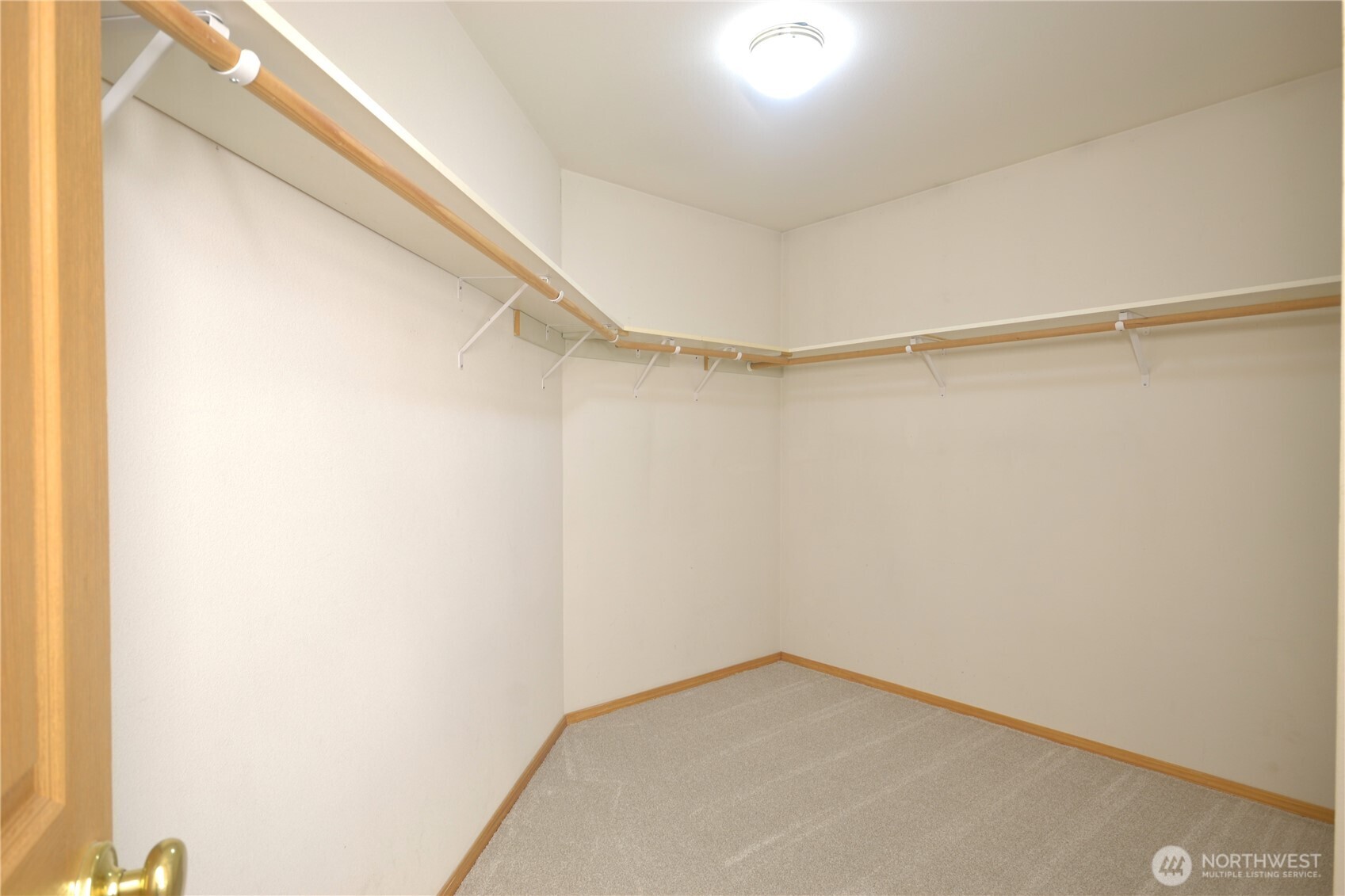 Big primary bedroom closet.