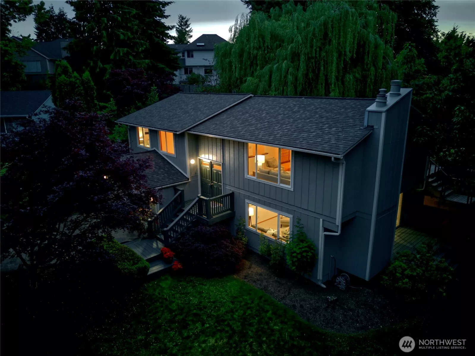 Discover your own private oasis at the end of a cul-de-sac in the heart of Newport Hills. This beautifully updated split-entry home sits on an expansive, wooded lot of over an acre, with the tranquil Coal Creek flowing through the backyard—offering both privacy and natural beauty. Must See!