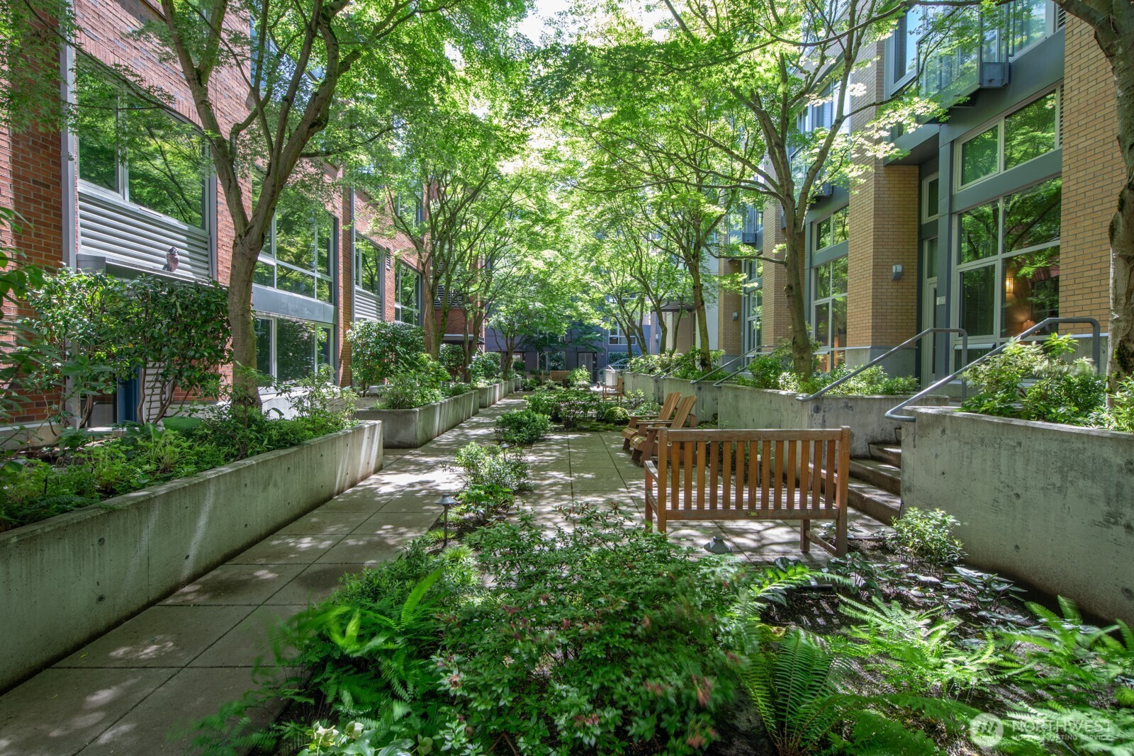 Tree-lined pathways and garden beds offer a quiet escape in the heart of the city.