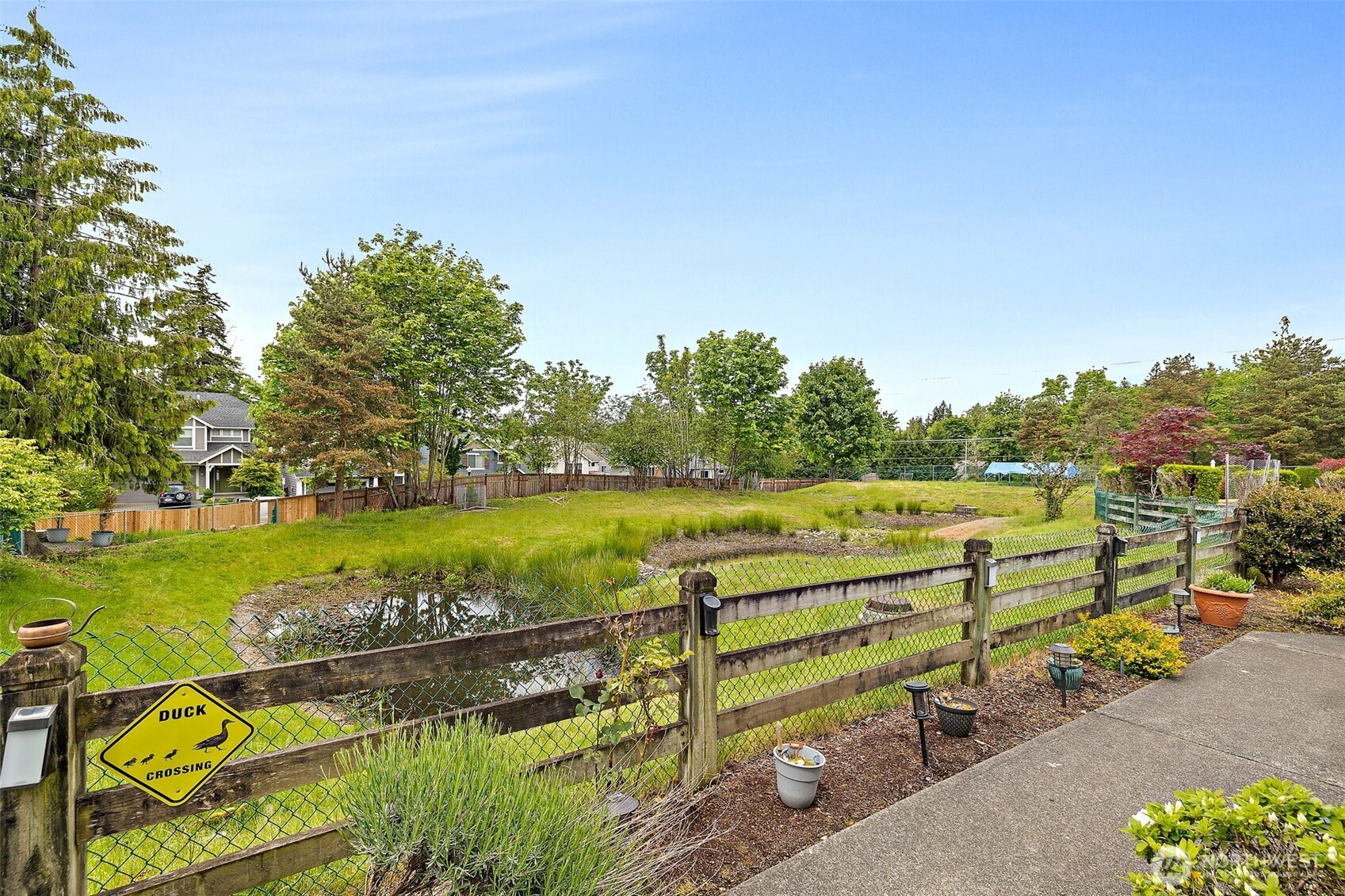 The view from your front porch! The end unit means you will enjoy your privacy while you watch the local wildlife.