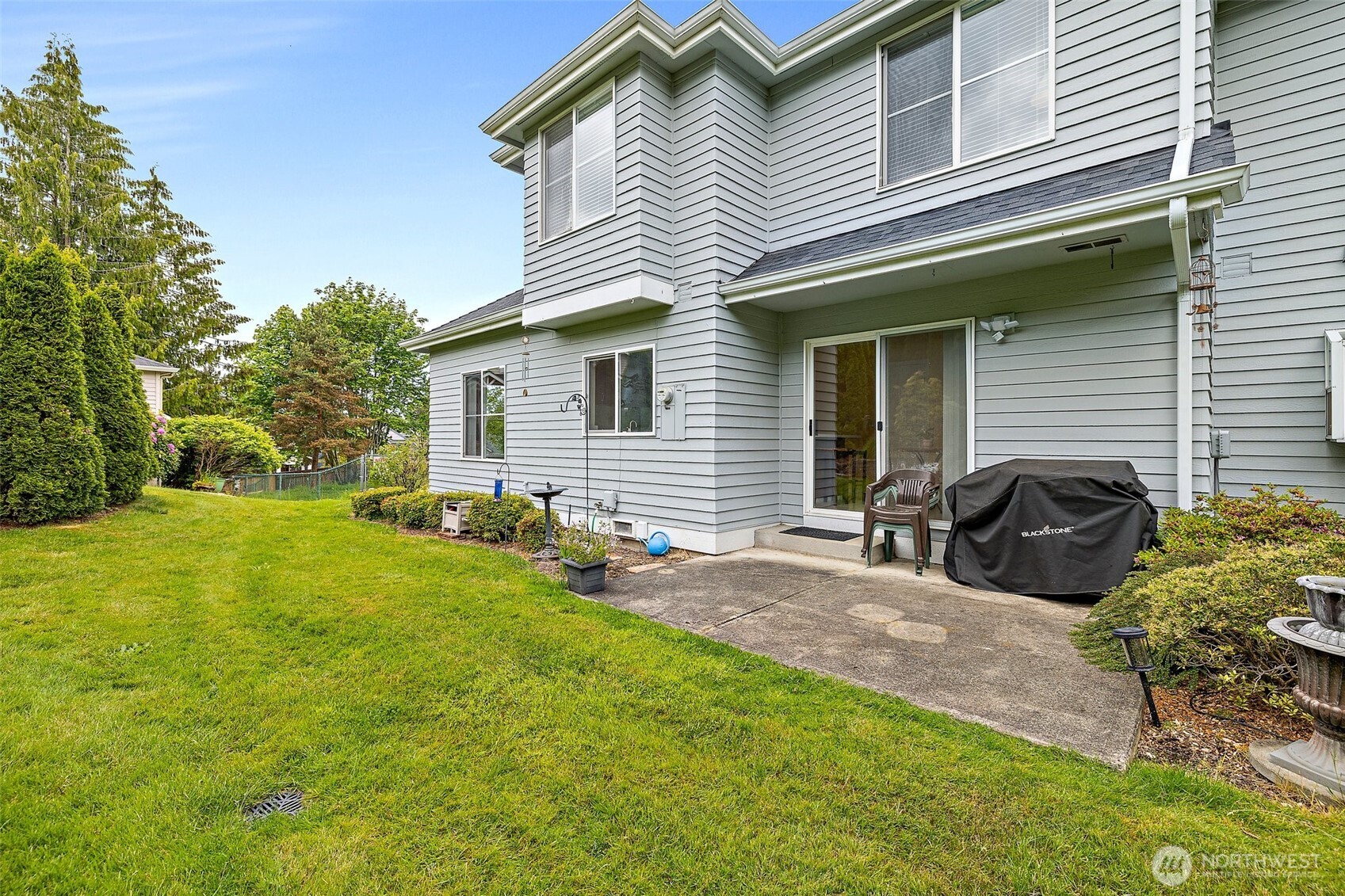 Another angle of your backyard - great spot for planter gardening.