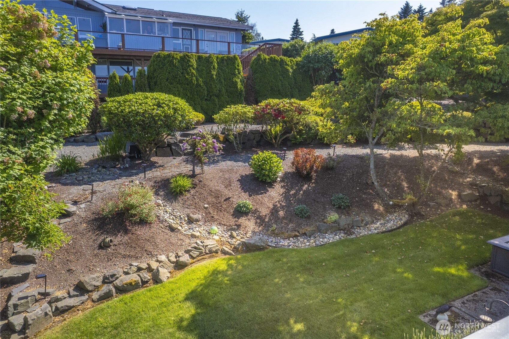 With Mature Trees, Plants and Shrubberies, this wonderful yard offers a Green Canopy and a very quiet and relaxing setting.