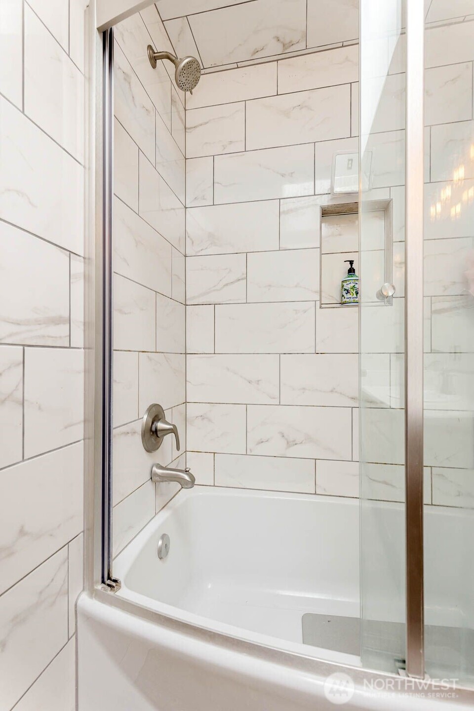 New tile, fixtures & shower door here too!