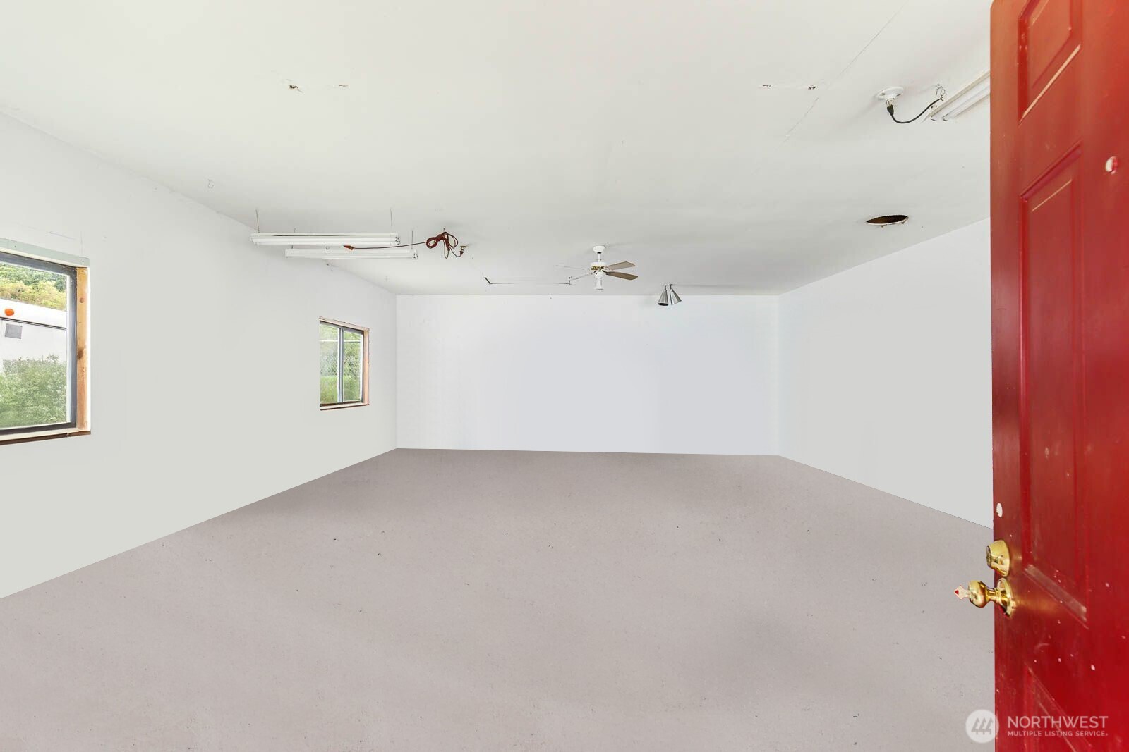 Inside the outbuilding. Wired & ready for your personal touches.