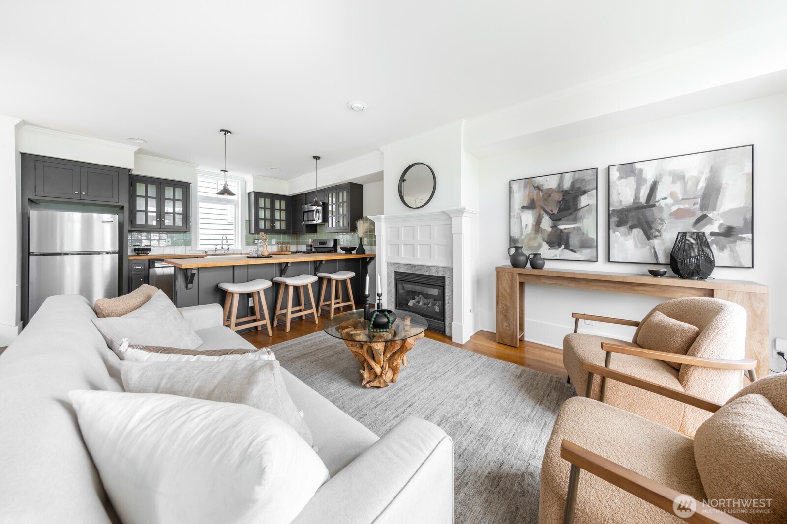 he main floor features a gourmet kitchen, terrace, living, and powder rooms.