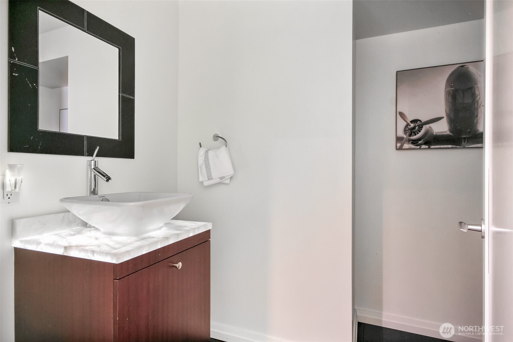 Powder room with Cristallo backllit counters