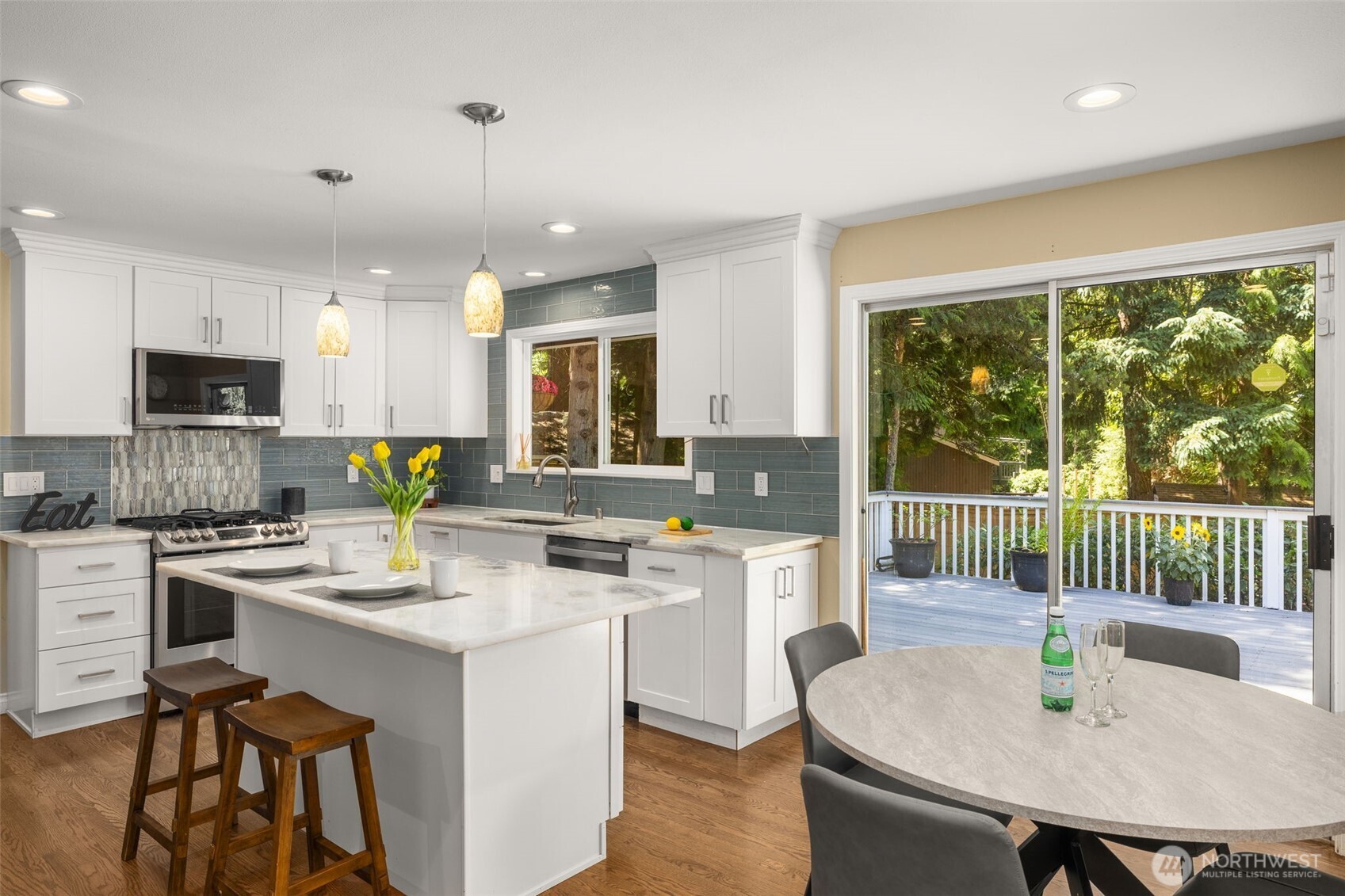 Large island plus additional eating space in the kitchen