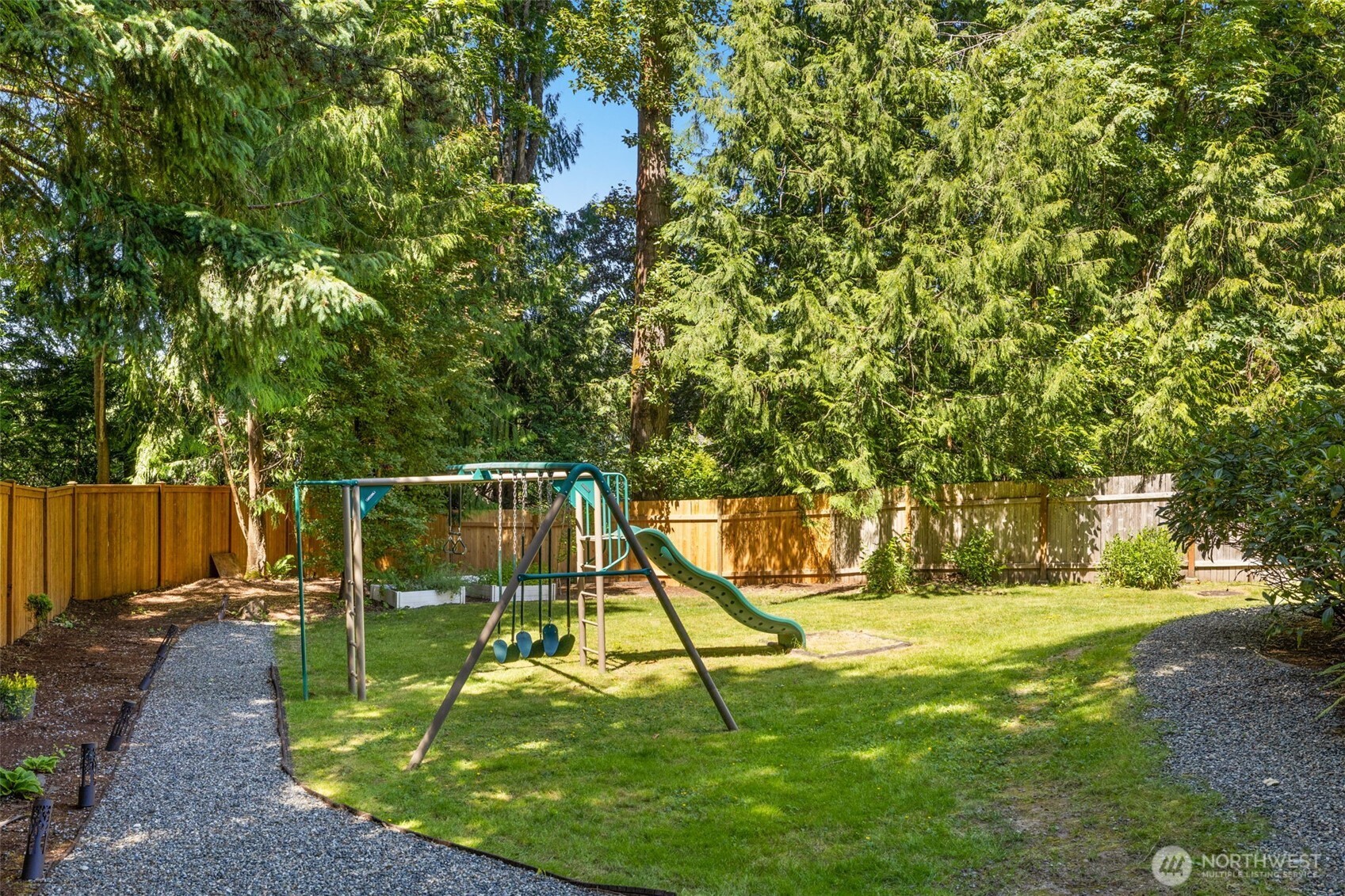 Fully fenced & beautifully landscaped yard