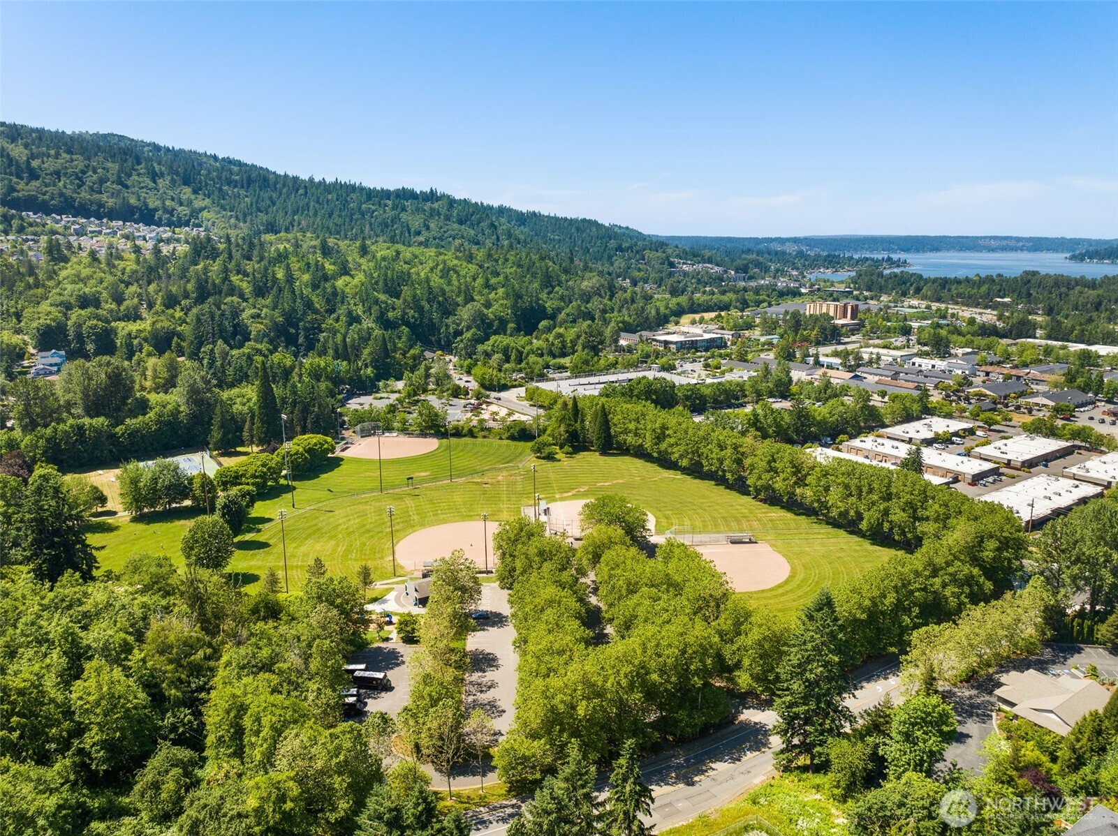 An overhead view of Tibbetts Valley Park and the surrounding vibrant downtown Issaquah!