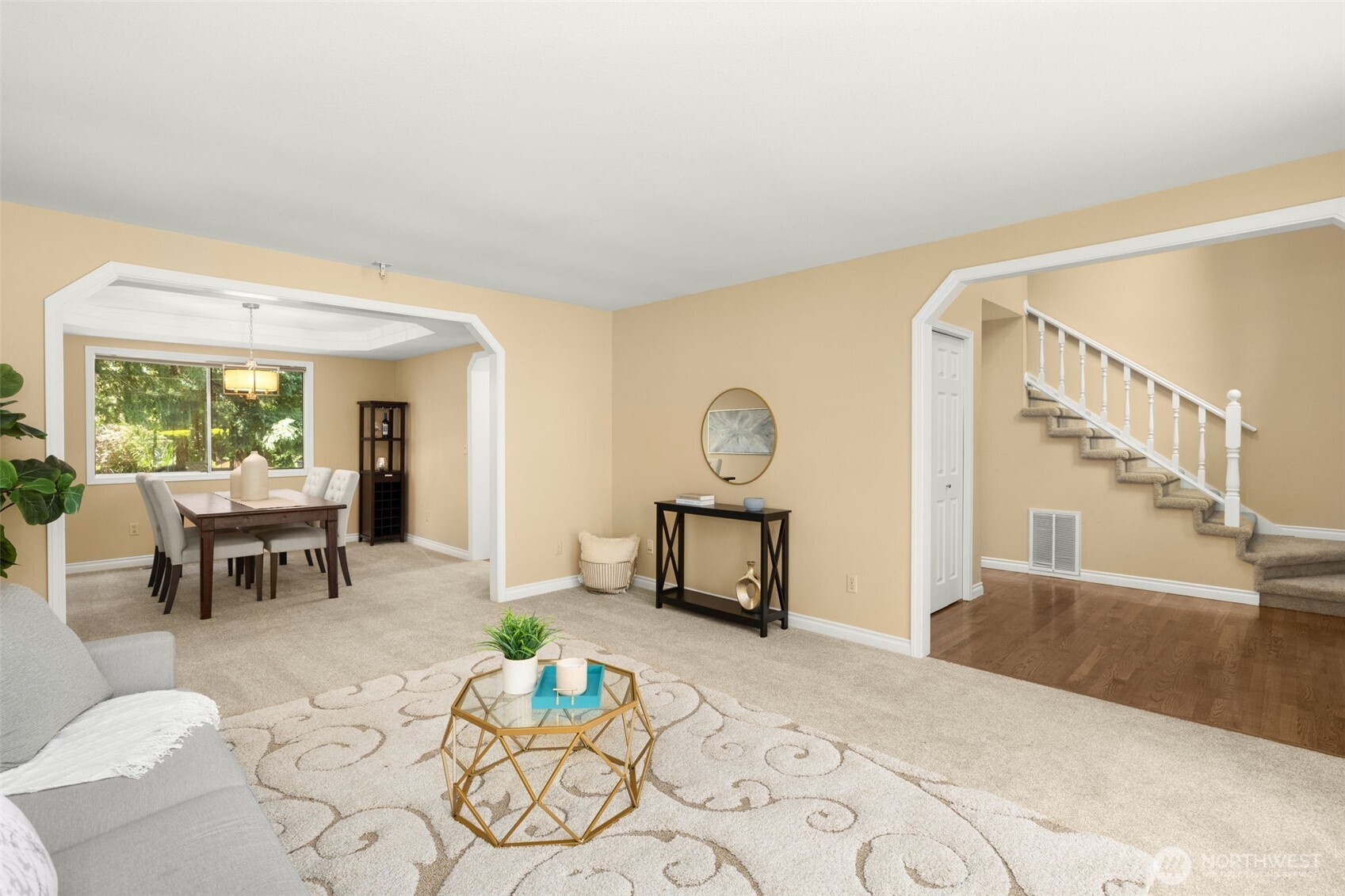 Another view of the living room, leading into the dining room