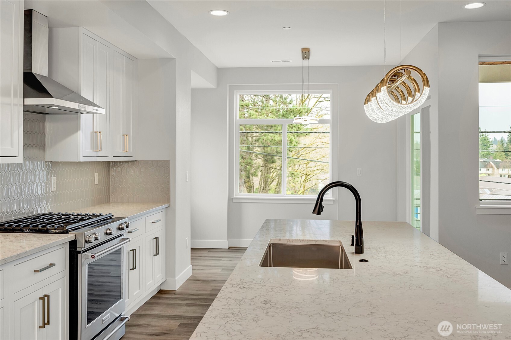 Large windows in kitchen and dining room
