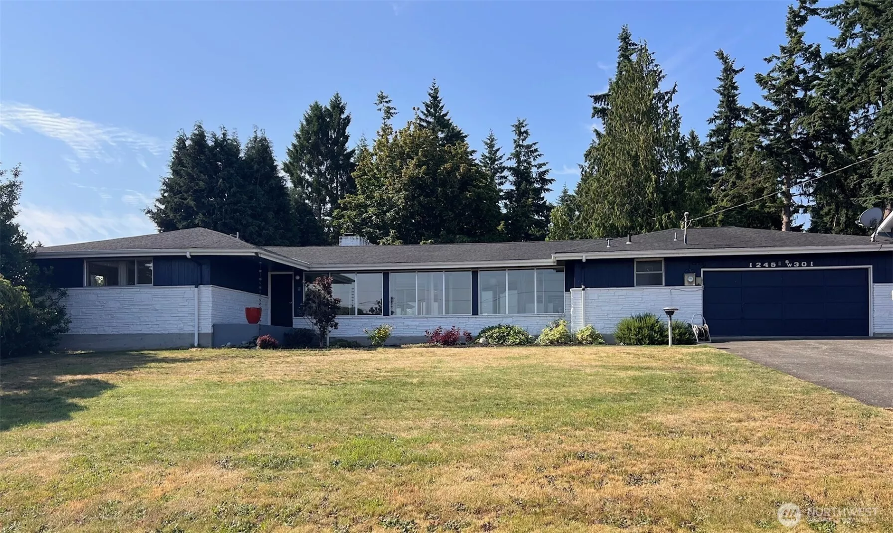 Nothing but upside with this 3160 sqft daylight basement home perfectly situated on a .91 acre lot that offers Sound and Mountain views. The 3160 sqft, daylight basement home offers opportunities for mutigenerational living and many other uses for it's ample spaces with living spaces on both levels