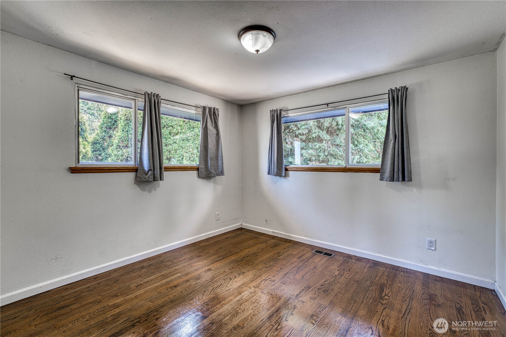 One of the three main level bedrooms that include the primary suite.