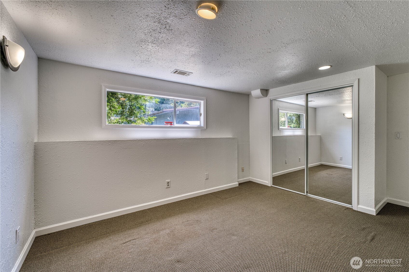 Another view of the lower level flex room #2. There are two flex rooms located on the lower level.