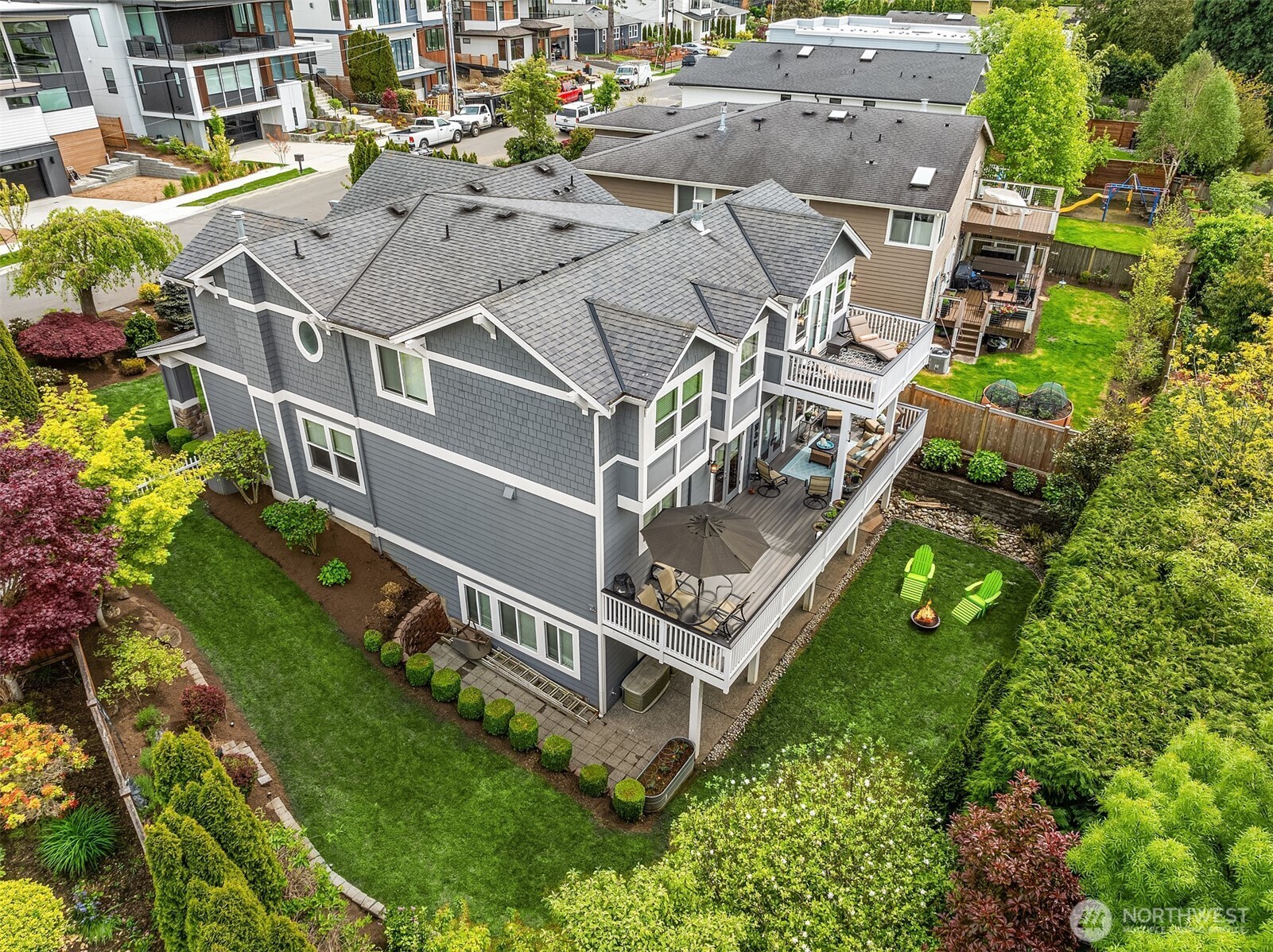 This photo gives you a great feel for both the scale of this home and its private setting. The lot is large enough to create space between neighbors without being too much to maintain. The back yard is the perfect amount of space to have a game of catch or to play with your dog.