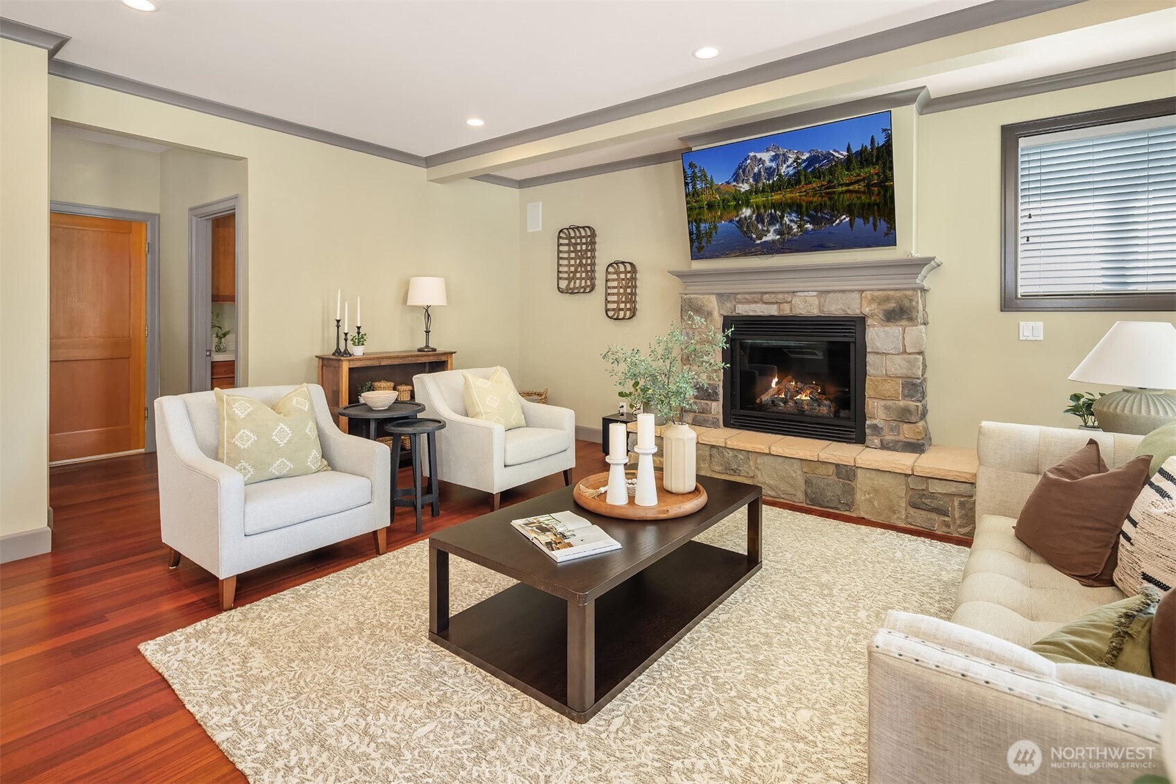 The great room is extremely easy to furnish. If TV is your thing, the space above the fireplace makes a great spot.
