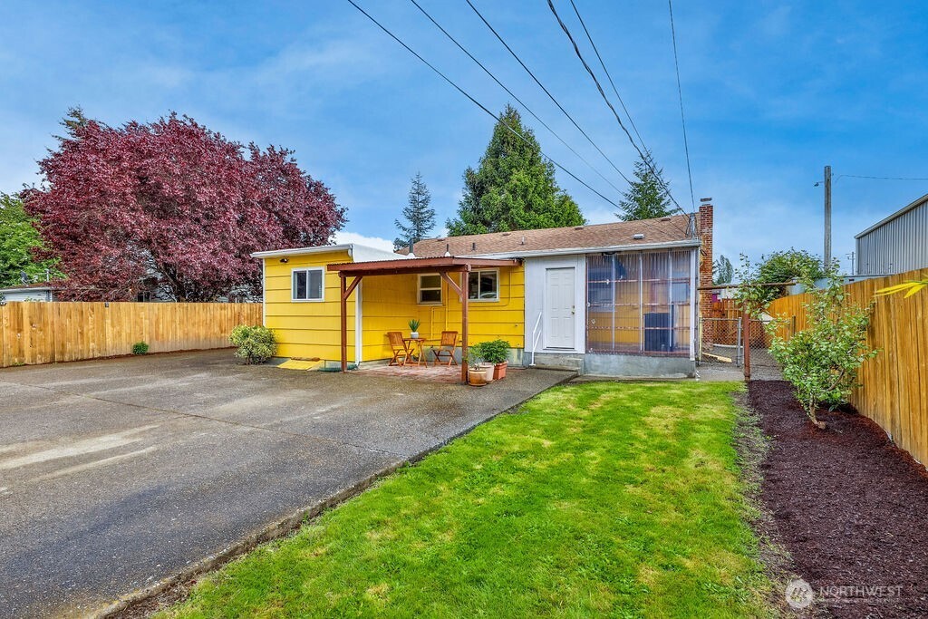 Main House and Detached garage with separate utility meter. Large lot with ample parking
