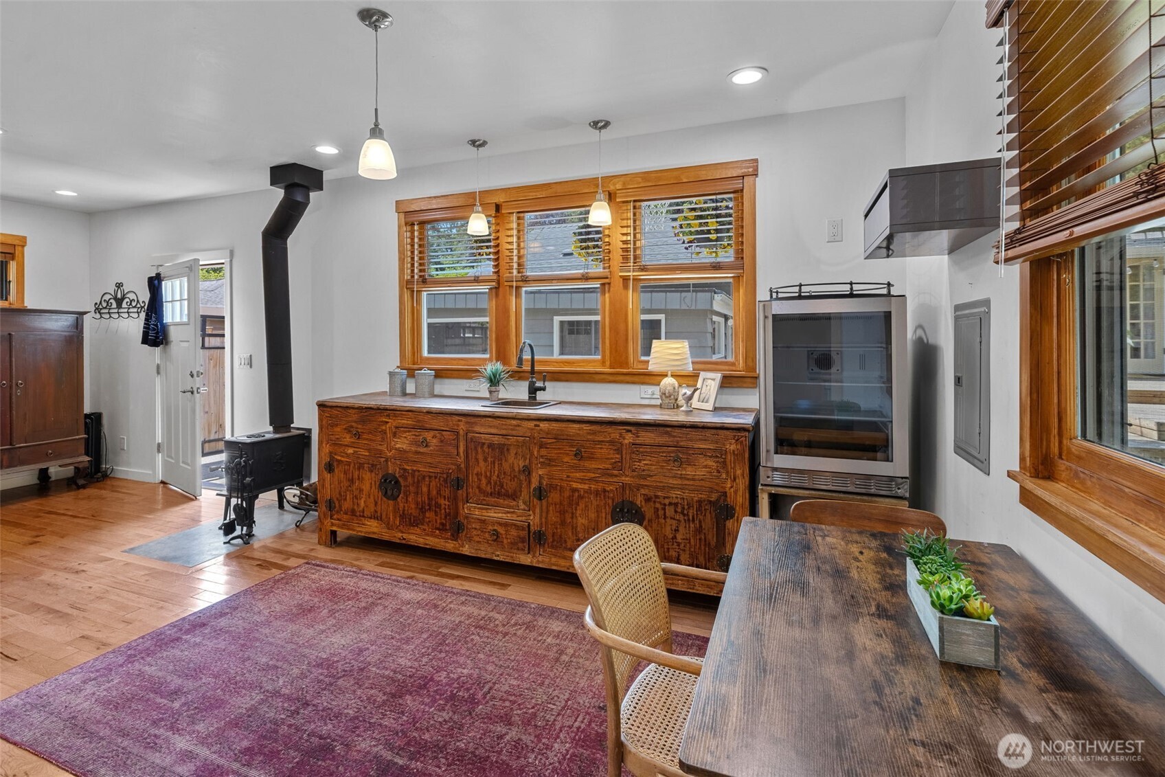 Studio has fun vintage touches and a cozy wood stove.
