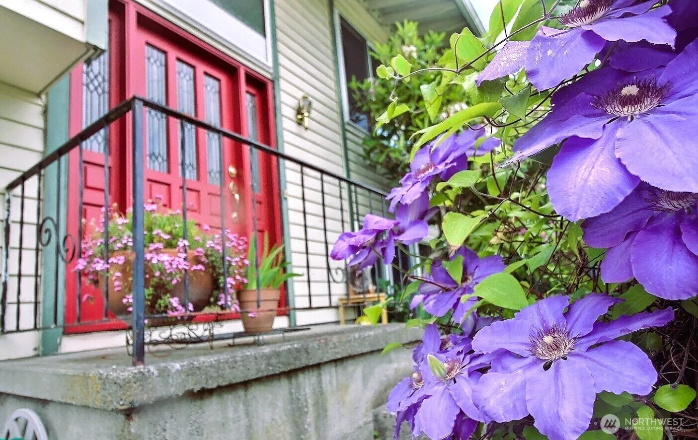 Darling front door welcomes you home.