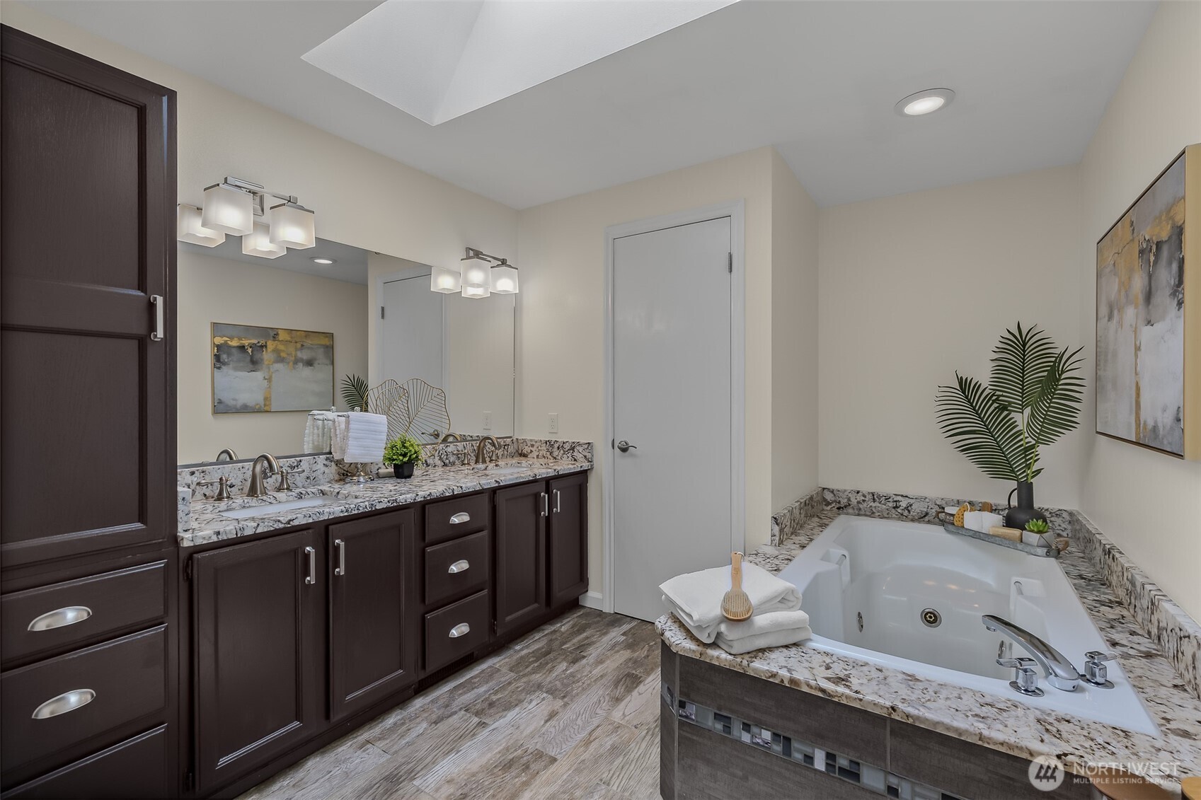 5-piece ensuite primary bathroom. Cabinets painted spring 2025.