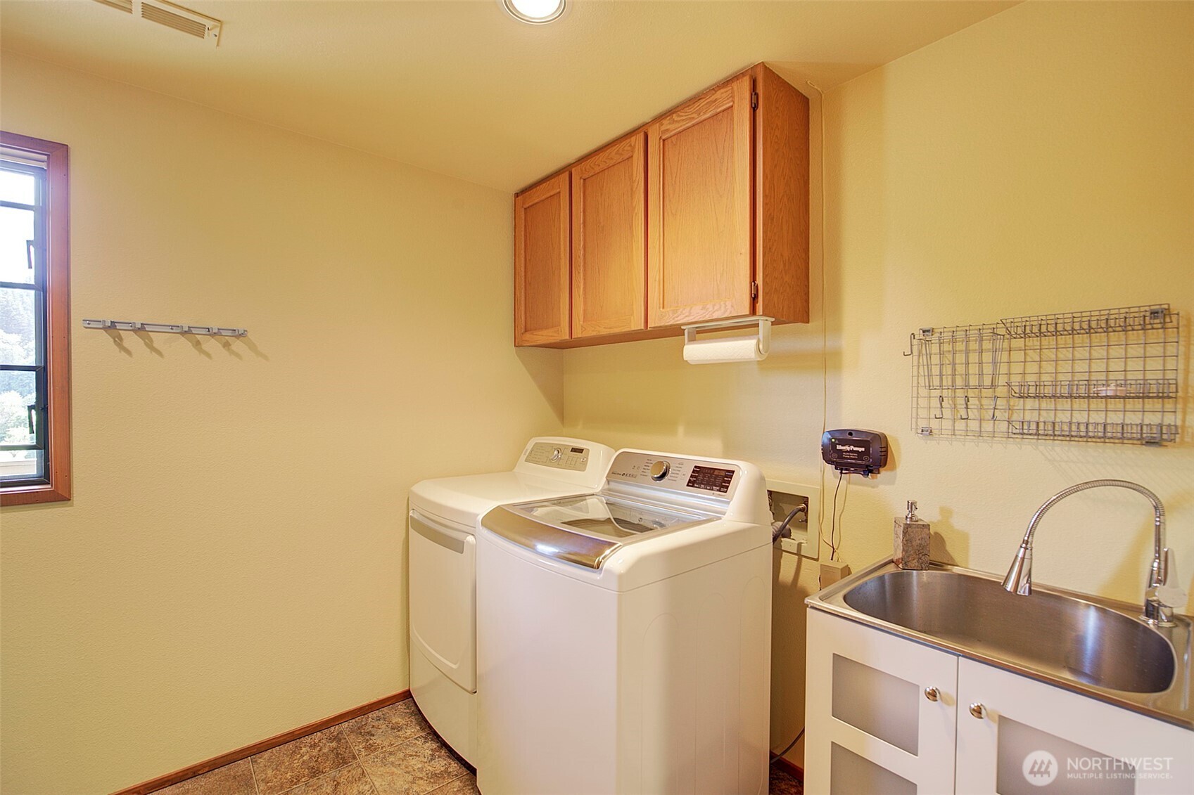 Lower utility room with utility sink & extra storage
