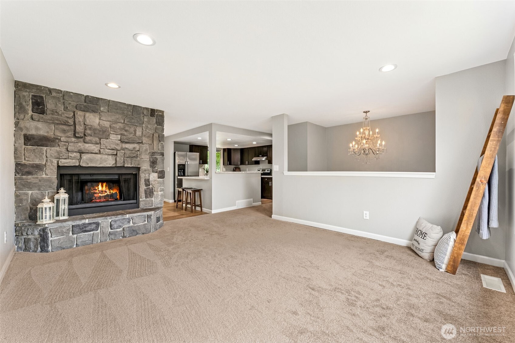 Living room with wood burning fireplace
