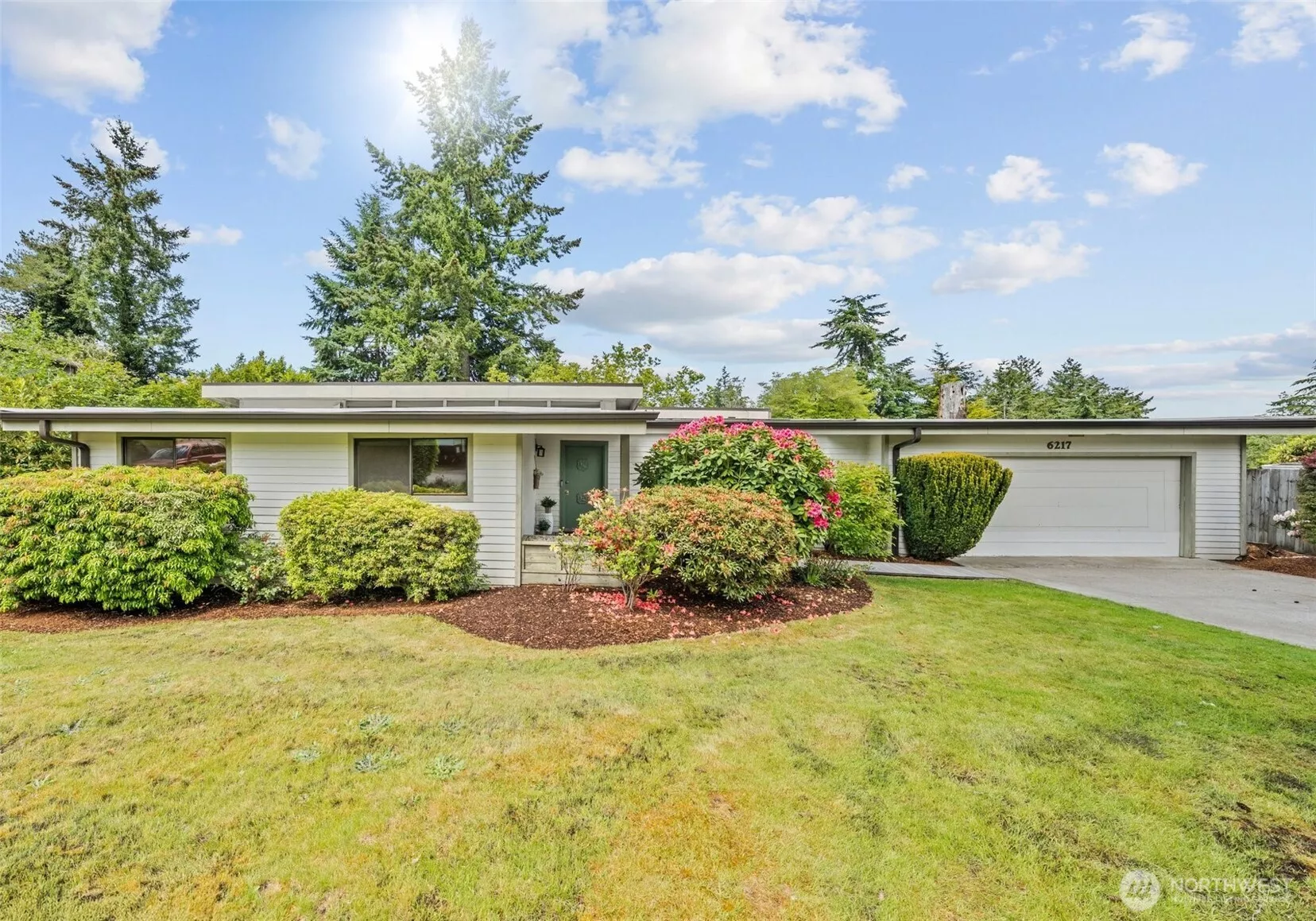 Mid-Century Modern in one of Lakewood's quiet and coveted neighborhoods.