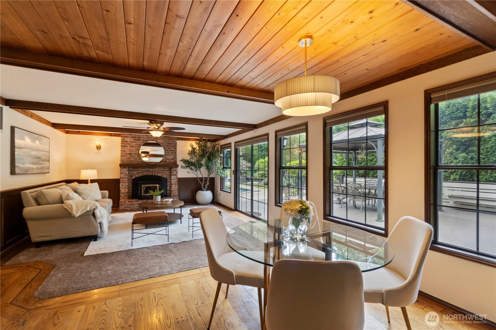 This is the breakfast nook or casual dining room looking into the 2nd living room (there are 3 living rooms in this home!)