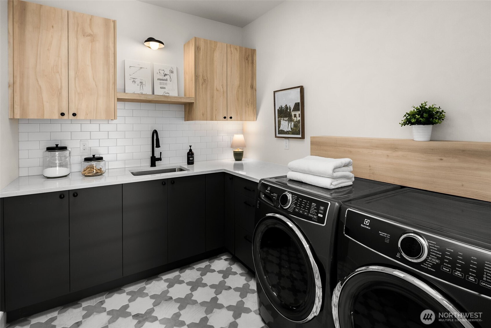 Laundry room on 2nd floor with plenty of storage.