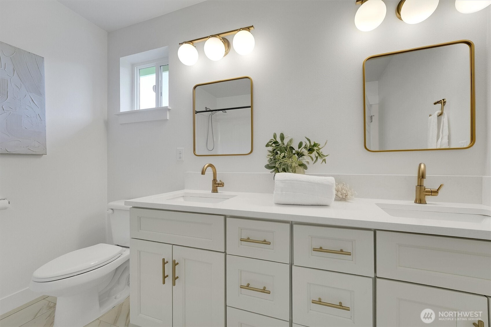Primary ensuite, double vanity, ceramic tile floors, quartz counter, gold fixtures