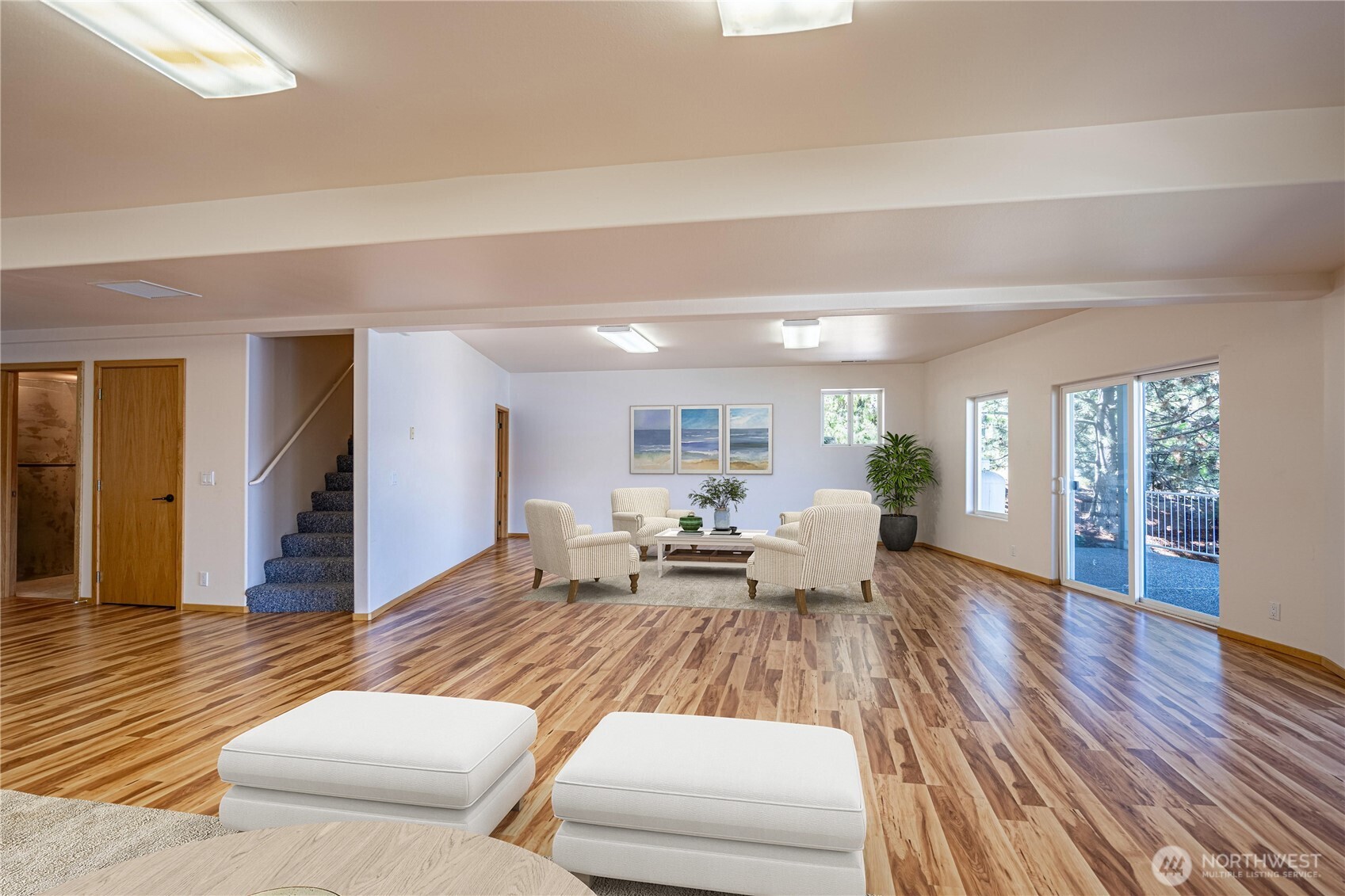 Loft overlooking main living area  Virtually staged