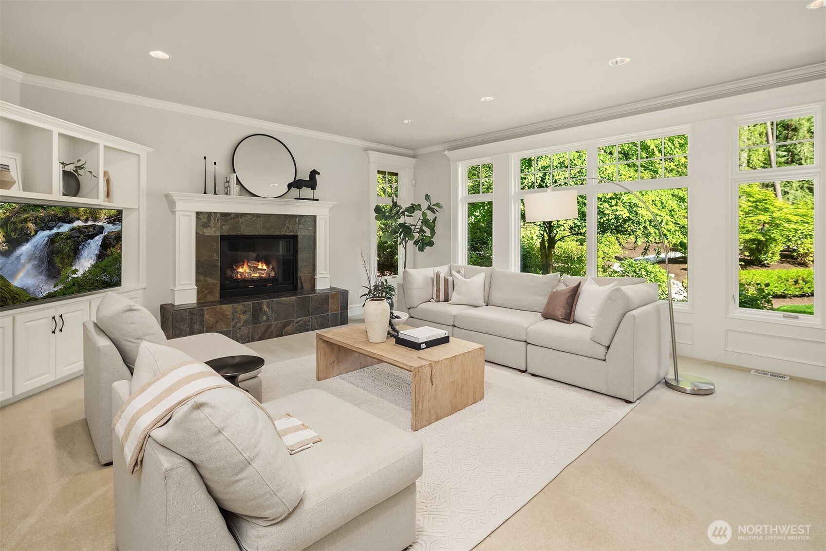Another view of eating area and family room with the exterior patio accessed by custom sliding door.