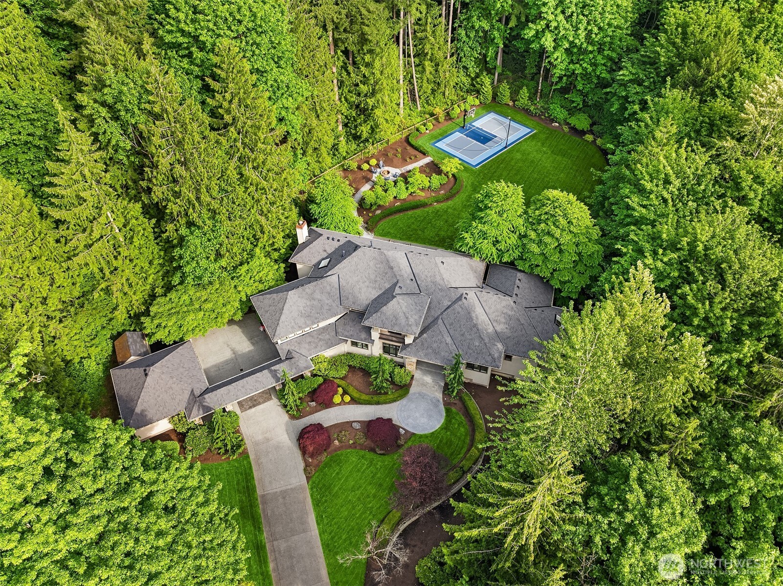 Another aerial shot of the home and back yard.
